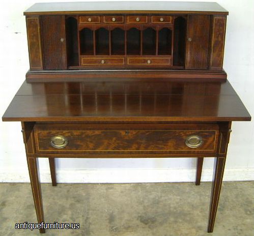 Antique Flame Mahogany Tambour Desk